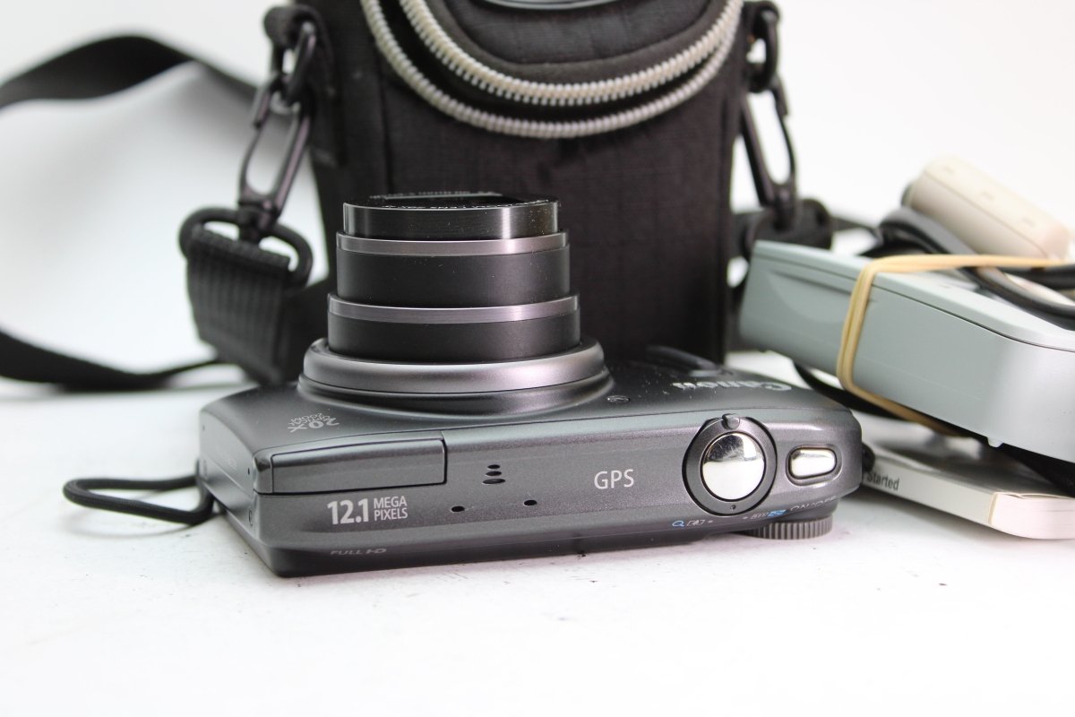 Canon PowerShot SX260 HS - Olympus