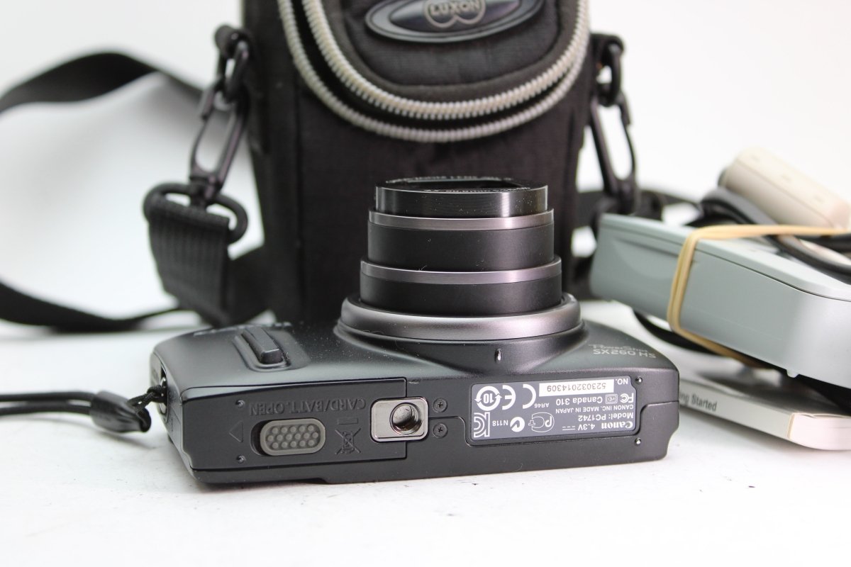 Canon PowerShot SX260 HS - Olympus