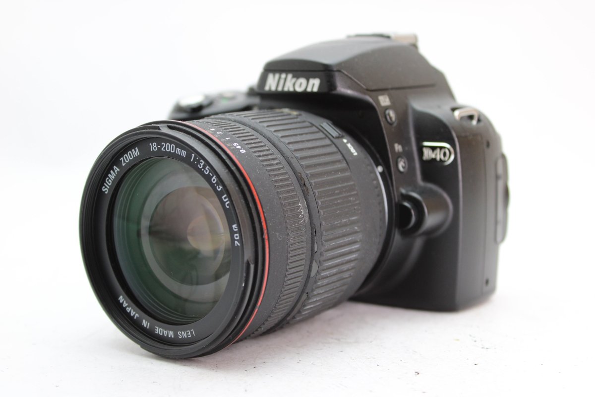 Nikon D40 + 18-200mm f3.5-6.3 D - Nikon