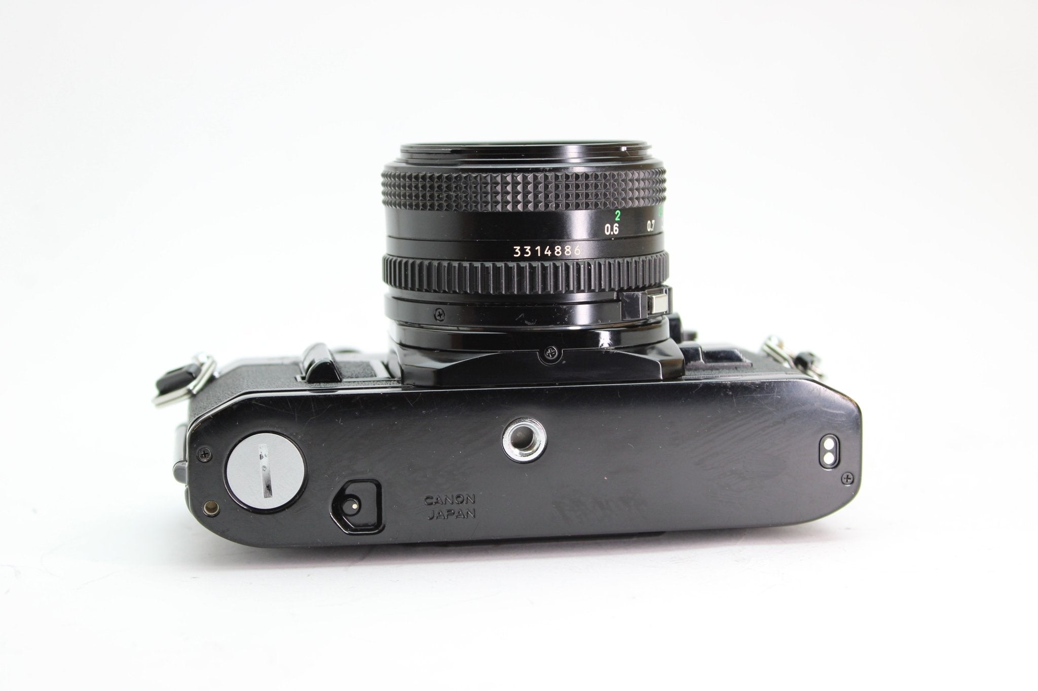 Canon AE-1 + 50mm f/1.8 - Canon - FD