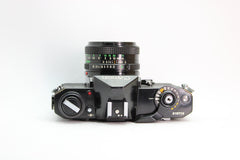 Canon EF + 50mm f/1.8 - Canon
