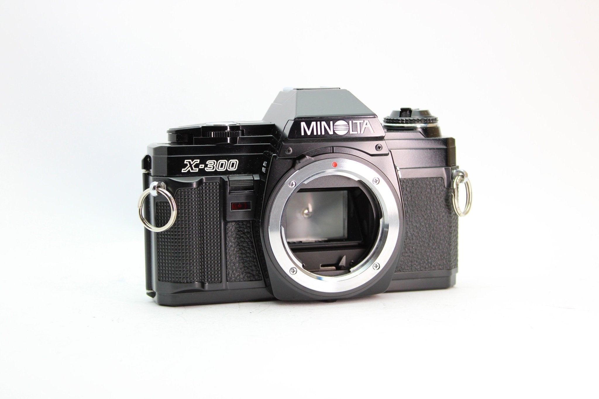 Minolta X-300 + 50mm f/2 - Minolta