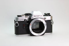 Olympus OM-10 + 50mm - Olympus